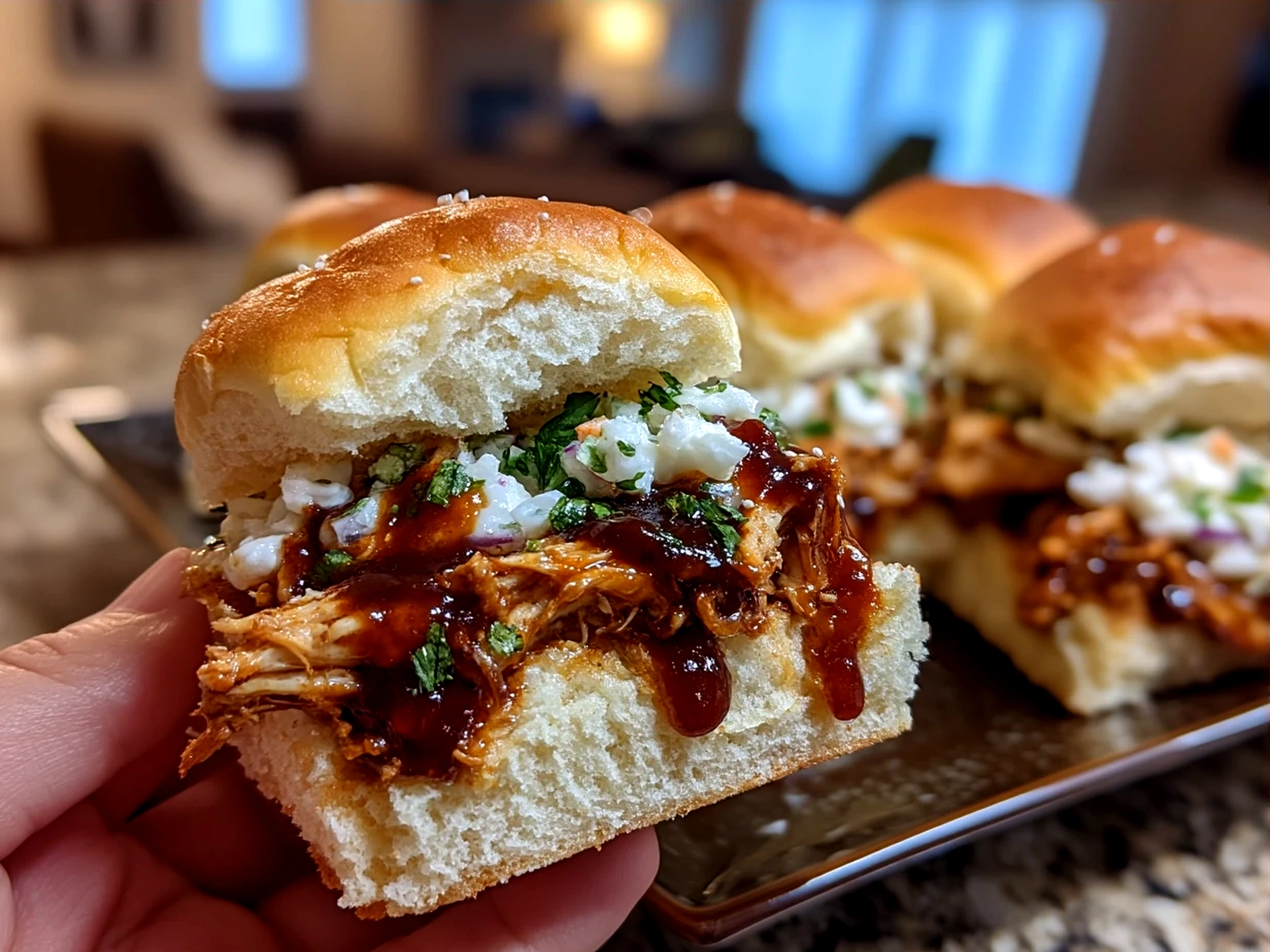 Freshly assembled BBQ Chicken Sliders served on a platter